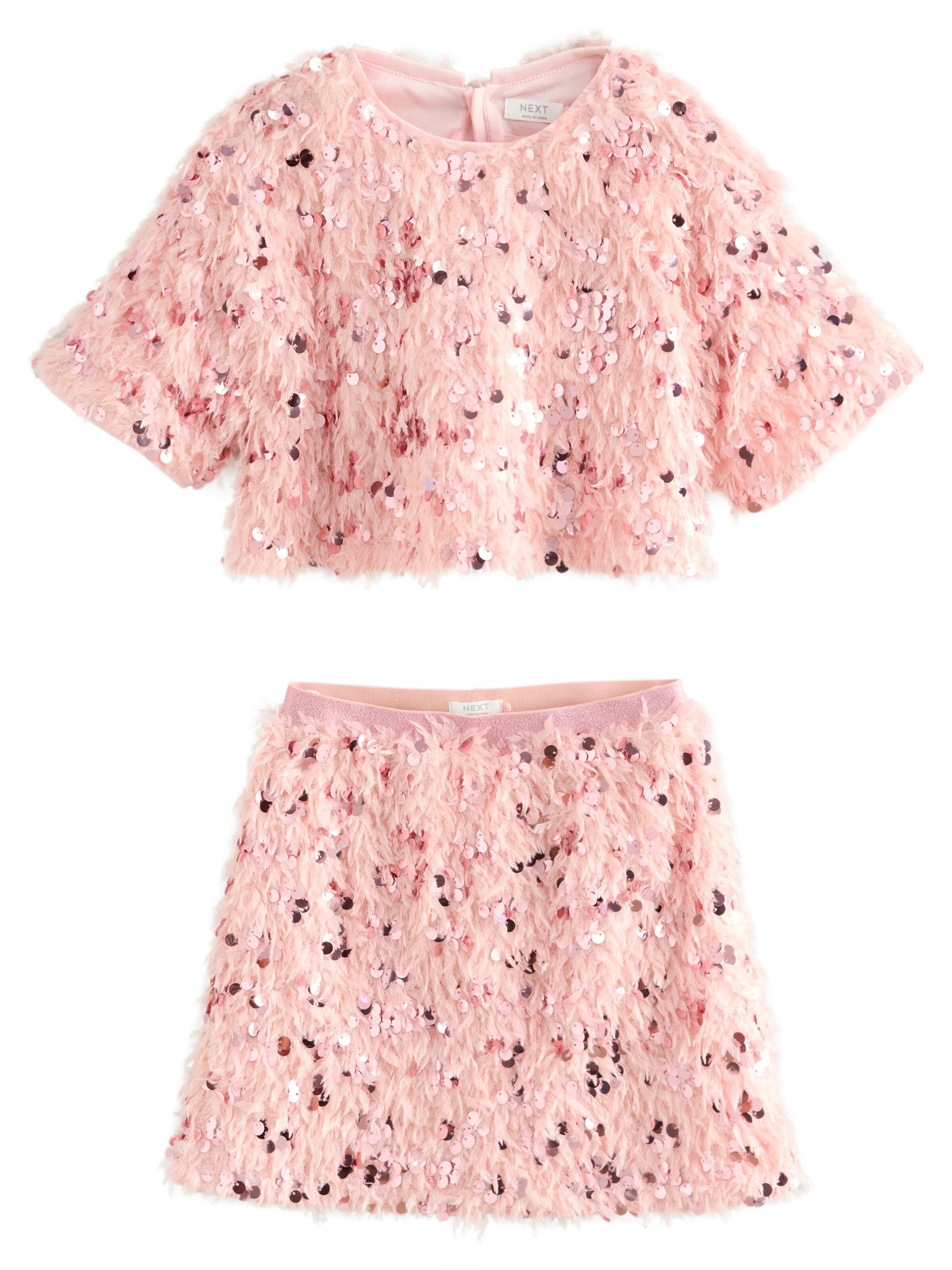 Next Set i rosa: framsida