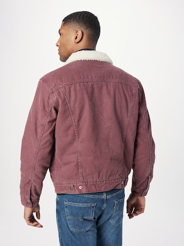 LEVI'S ® Overgangsjakke 'Type 3 Sherpa Trucker' i pink