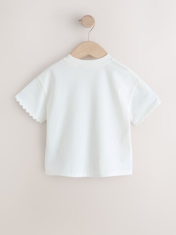 T-Shirt Next en blanc
