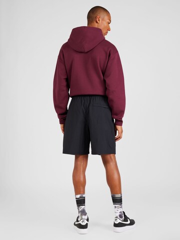 Nike Sportswear Regular Byxa 'Solo Swoosh' i svart