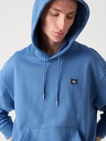 Sweat-shirt Calvin Klein Jeans en bleu