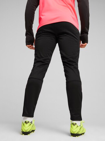 PUMA - Tapered Pantalón deportivo 'TeamLIGA' en negro