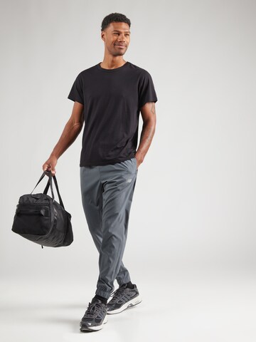new balance Alt kitsenev Spordipüksid 'Essentials Active', värv hall