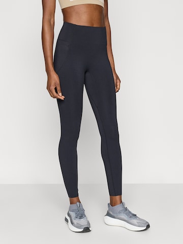 Skinny Pantalon de sport 'Elite' UNDER ARMOUR en noir : devant