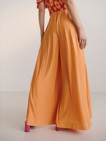 Wide leg Pantaloni 'Samantha' di Guido Maria Kretschmer Women in arancione