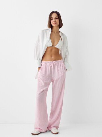 Bershka Zvonové kalhoty Kalhoty – pink