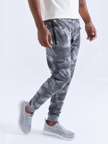 Tommy Life - Skinny Calças de desporto em cinzento