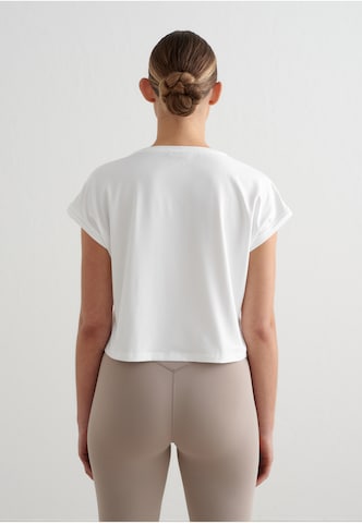 Maglia funzionale di Aim'n in bianco