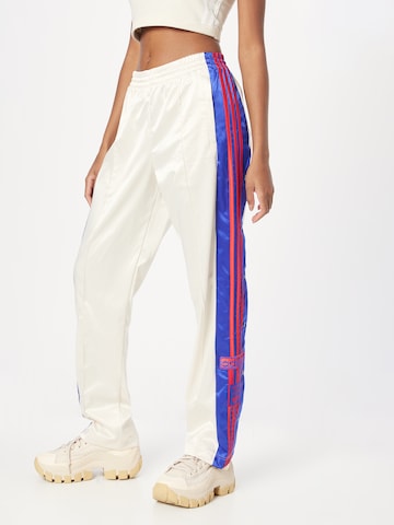 ADIDAS ORIGINALS - Loosefit Pantalón 'Satin Adibreak' en beige: frente