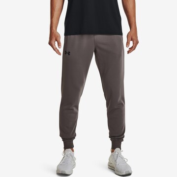 UNDER ARMOUR Tapered Workout Pants in Brown: front