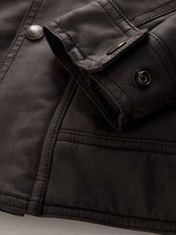 Next Tussenjas in Bruin