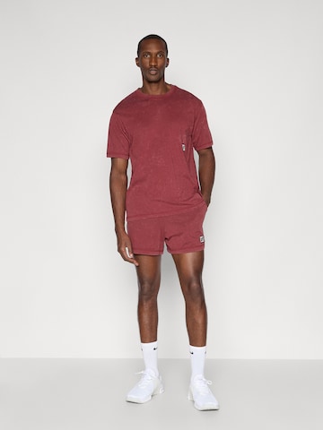 NIKE Sportshirt 'Heritage' in Rot