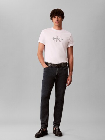 Calvin Klein Jeans Tapered Jeans in Blau