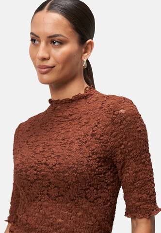 Top di zero in marrone
