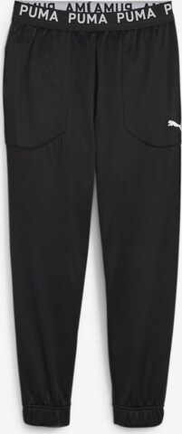 PUMA Tapered Sportbroek in Zwart: voorkant