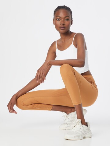 Girlfriend Collective Skinny Sporthose in Beige