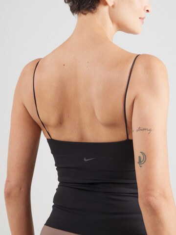 NIKE Спортивный топ 'ZENVY' в Черный