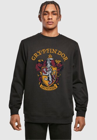 Felpa 'Harry Potter - Gryffindor Crest' di ABSOLUTE CULT in nero: frontale