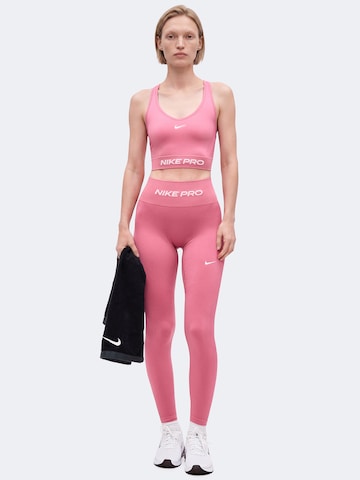 NIKE Skinny Παντελόνι φόρμας 'Nike Pro' σε ροζ