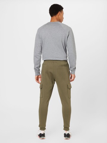 UNDER ARMOUR Tapered Sporthose 'Rival' in Grün