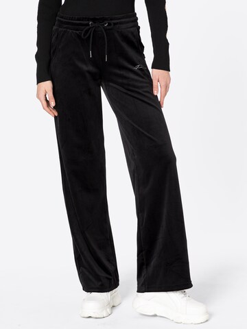 Loosefit Pantaloni de la FUBU pe negru: față