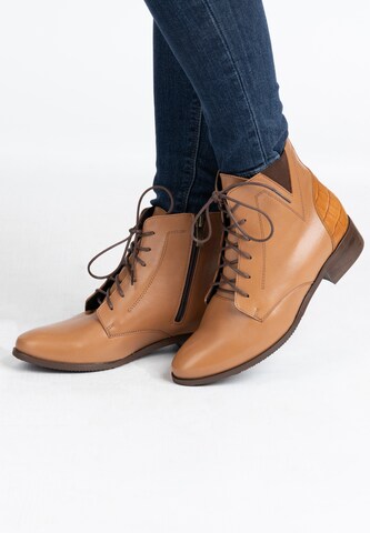 Usha Lace-Up Ankle Boots in Brown