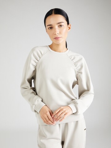 Sweat de sport Athlecia en beige : devant