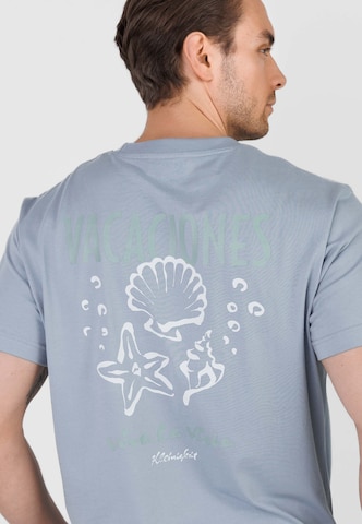 Kleinigkeit Koszulka 'Big Vacaciones' w kolorze niebieski