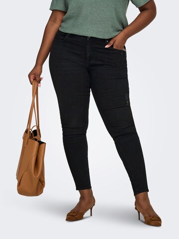 Skinny Jeans 'CARWilly' di ONLY Carmakoma in nero: frontale