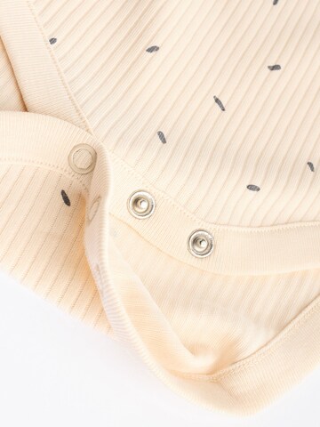 Tutina / body per bambino di Next in beige