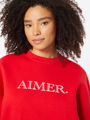 Les Petits Basics Sweatshirt 'Aimer' in Rot