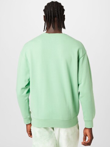 Coupe regular Sweat-shirt 'Relaxd Graphic Crew' LEVI'S ® en vert