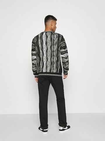 Carlo Colucci Kampsun, värv must: tagant vaates