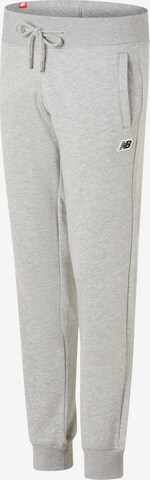 Effilé Pantalon new balance en gris : devant