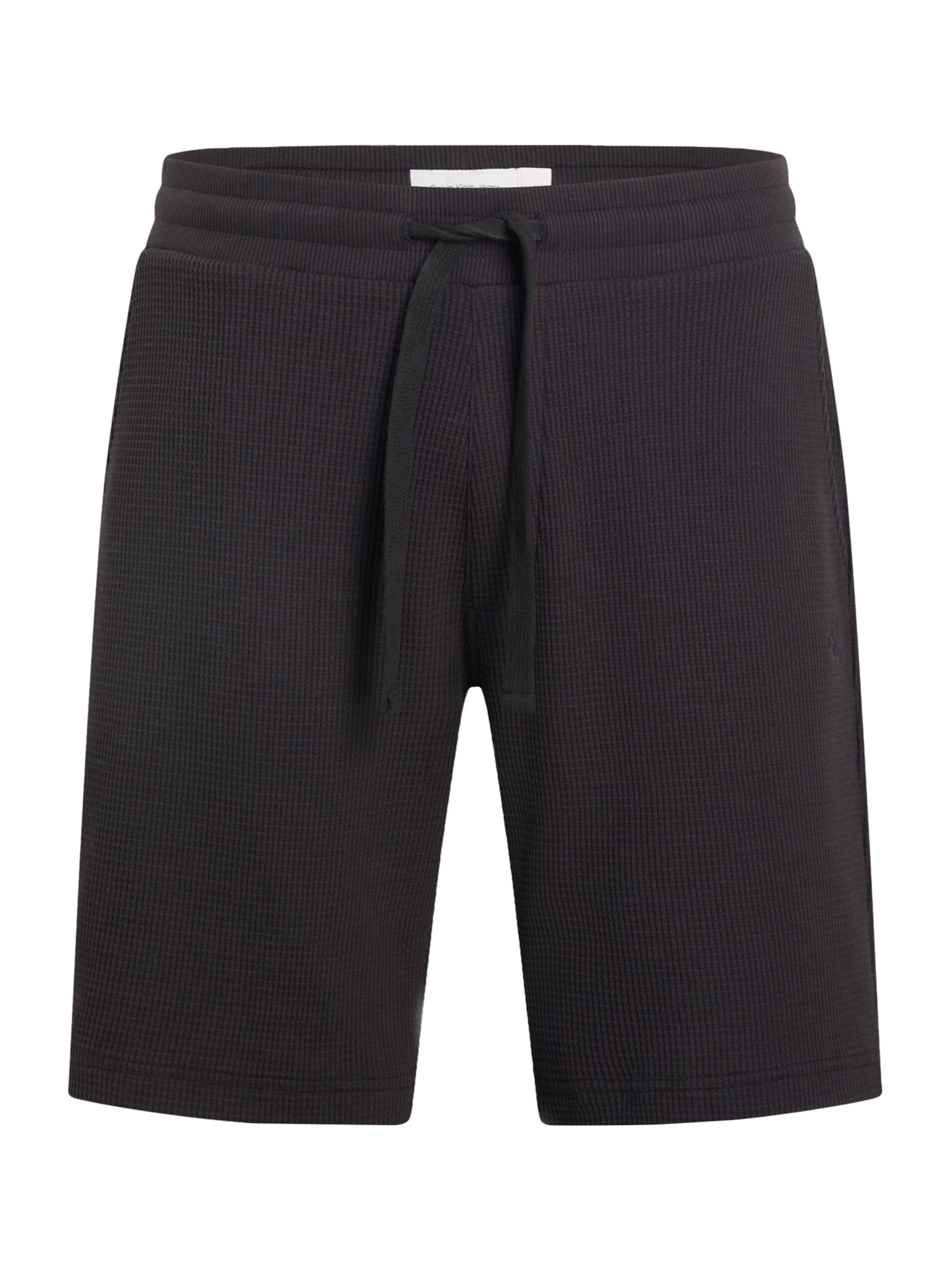 Calvin Klein Jeans Regular Trousers in Black: front