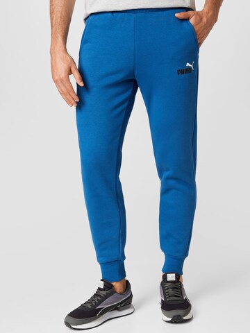 Tapered Pantaloni sport de la PUMA pe albastru: față