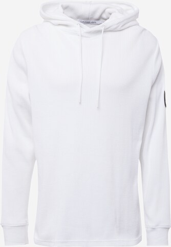 Sweat-shirt Calvin Klein Jeans en blanc : devant