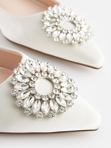 Next Slipper in Weiß