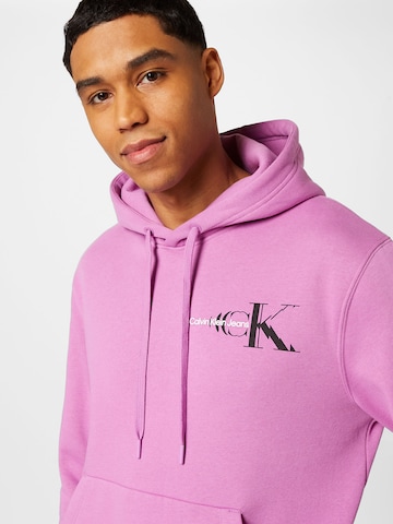 Calvin Klein Jeans Sweatshirt in Orchid | ABOUT YOU