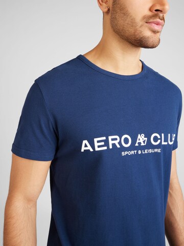 AÉROPOSTALE Tričko 'CLUB' – modrá
