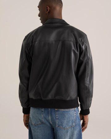 WE Fashion Tussenjas in Zwart