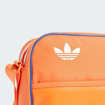 ADIDAS ORIGINALS Crossbody Bag 'Airliner' in Orange