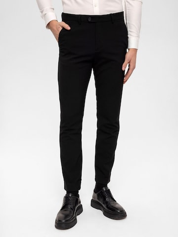 Antioch Slim fit Trousers in Black: front