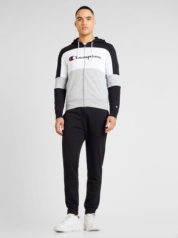 Champion Authentic Athletic Apparel Sports Suit in Black: front