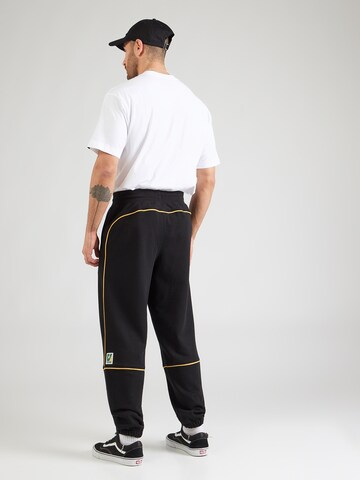 VANS Alt kitsenev Püksid 'Star V', värv must: tagant vaates