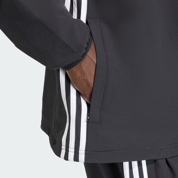 ADIDAS ORIGINALS Tussenjas 'Adicolor' in Zwart