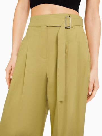 Bershka Loose fit Pleat-front trousers in Green