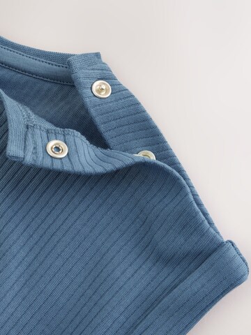 Next Strampler in Blau