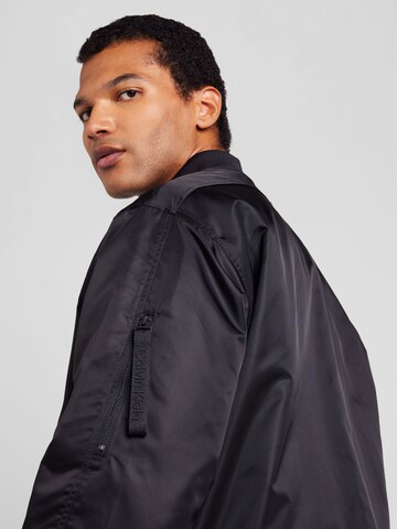 Calvin Klein Jeans Jacke 'HERO' in Schwarz