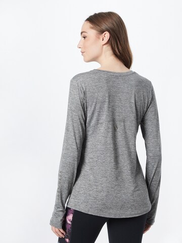 T-shirt fonctionnel SKECHERS en gris